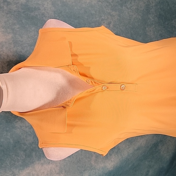 "Greg Norman Play Dry Golf Sleeveless Polo w/ Paneled Sides - Picture 7 of 7